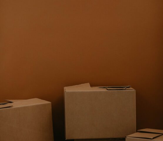white cardboard box on brown wooden table